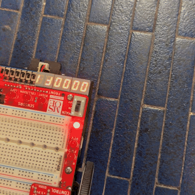 Single-cycle CPU hardware demo showing output on a seven-segment display